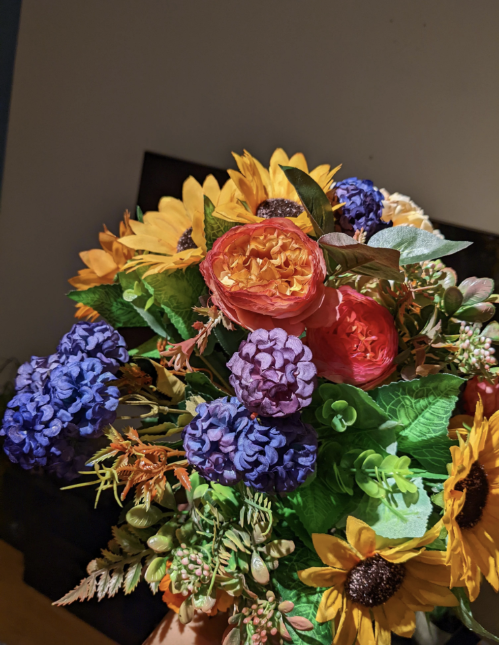 A bouquet of colorful fake flowers