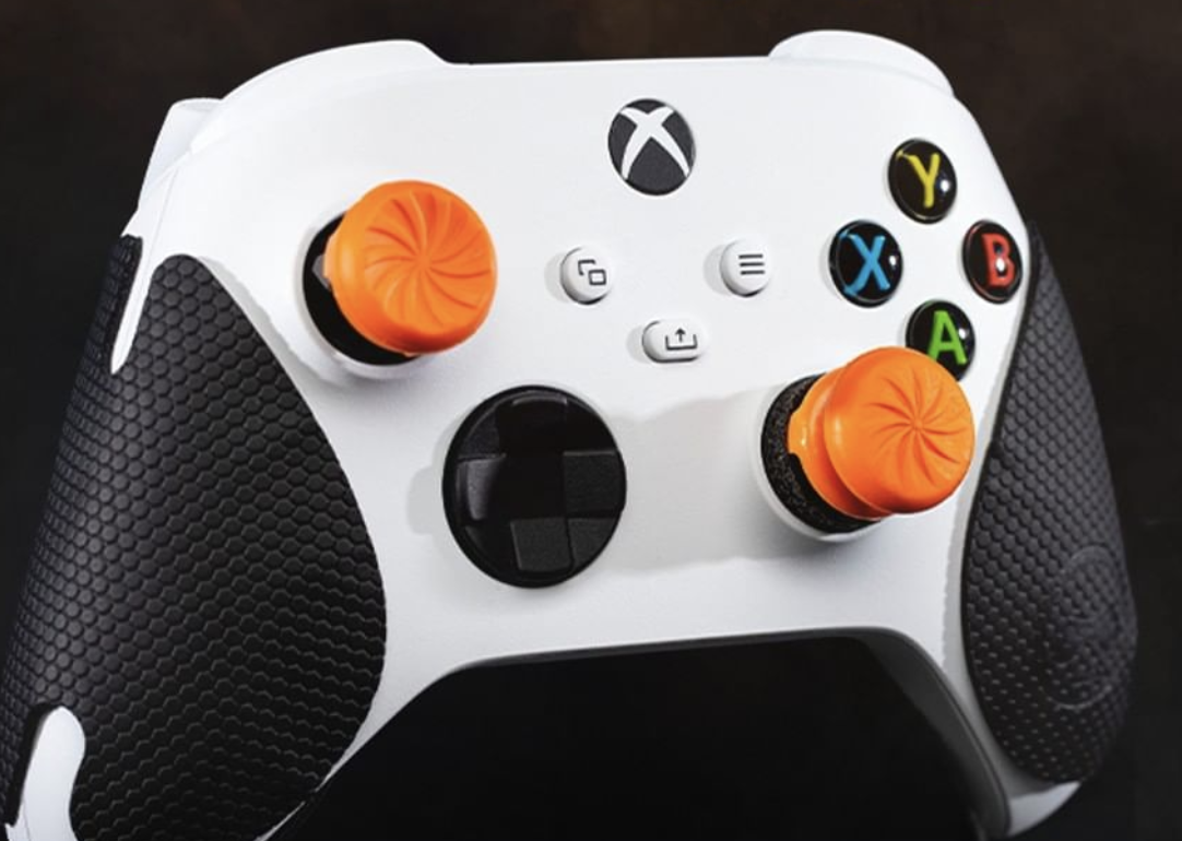 An xBox  controller with the thumbsticks on it