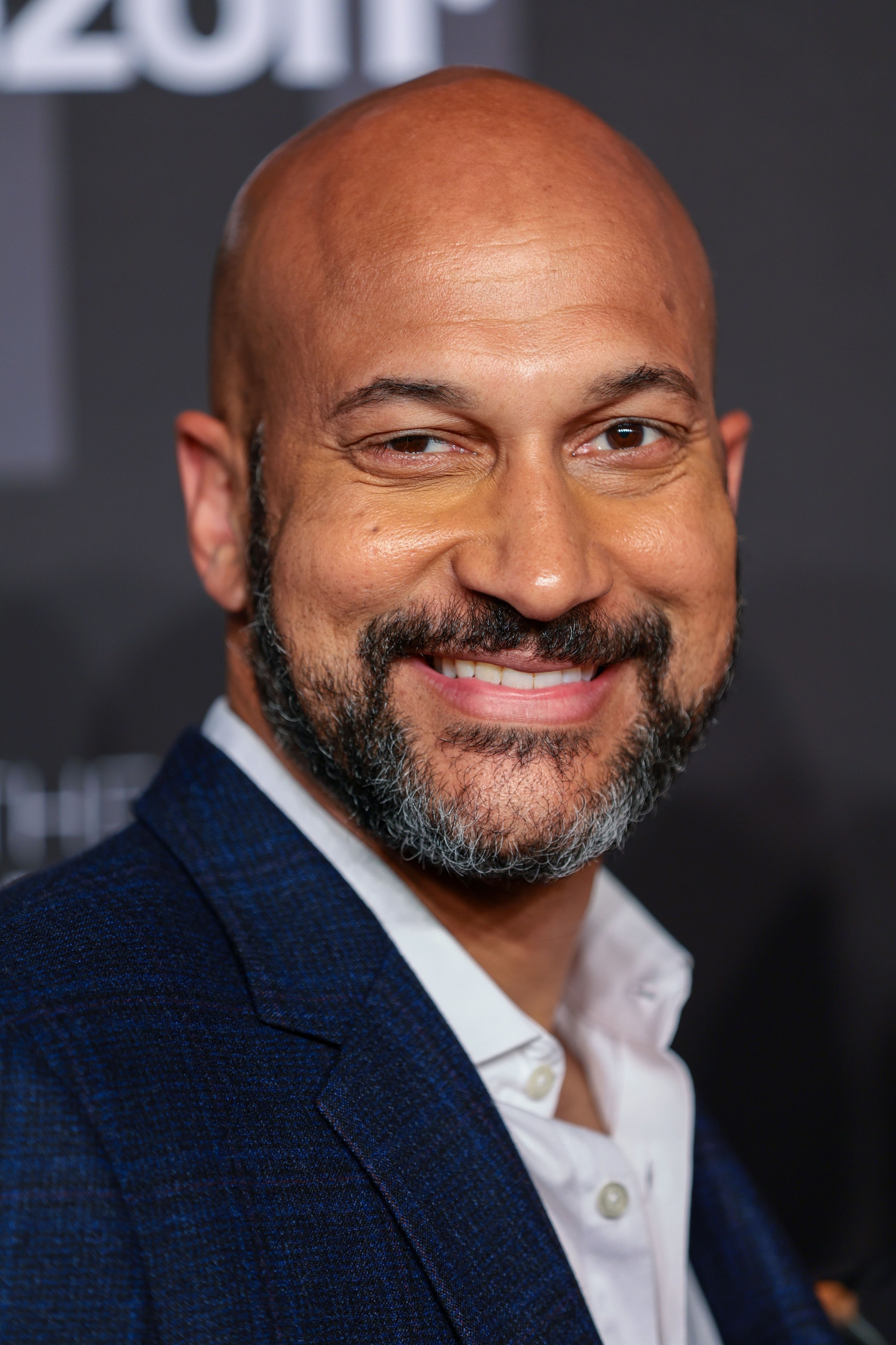 Keegan-Michael Key smiles at the Webby Awards on May 16, 2022