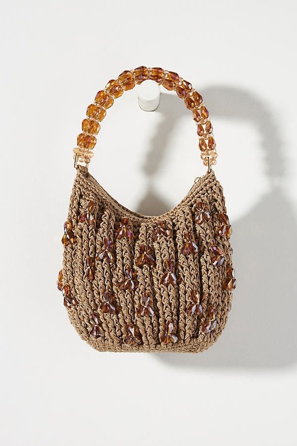 Brown crochet satchel with gold beaded handle, beaded accents on bag itself