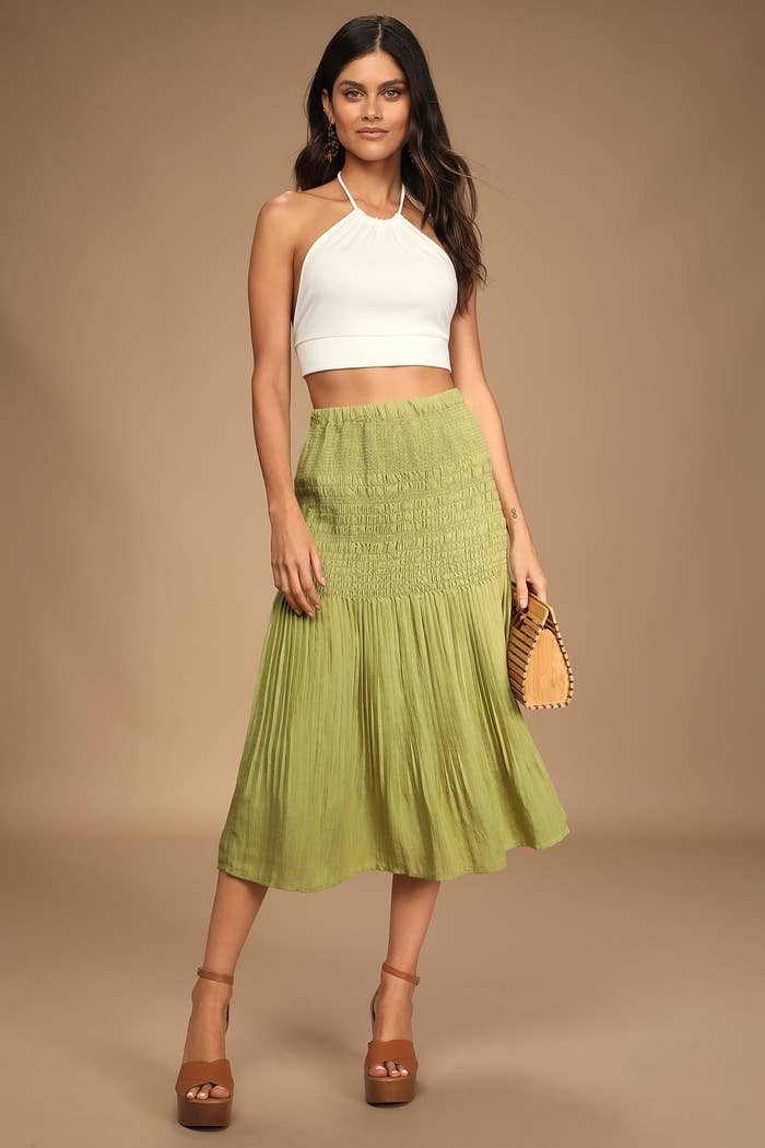 model wearing the skirt in green