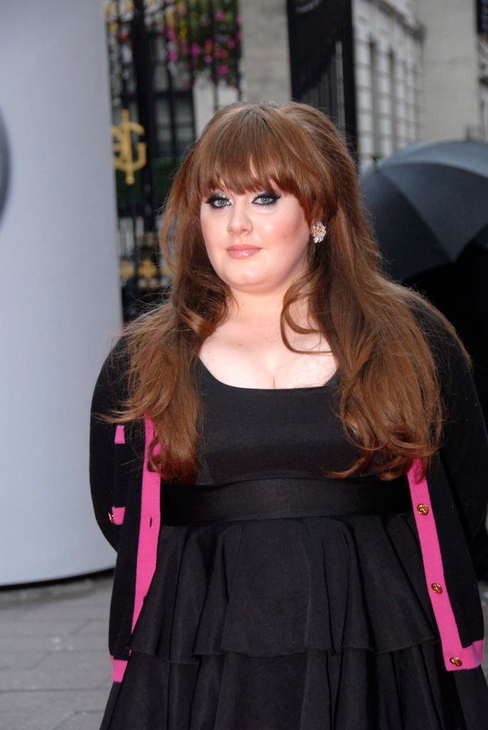 Adele with long hair and dramatic bangs