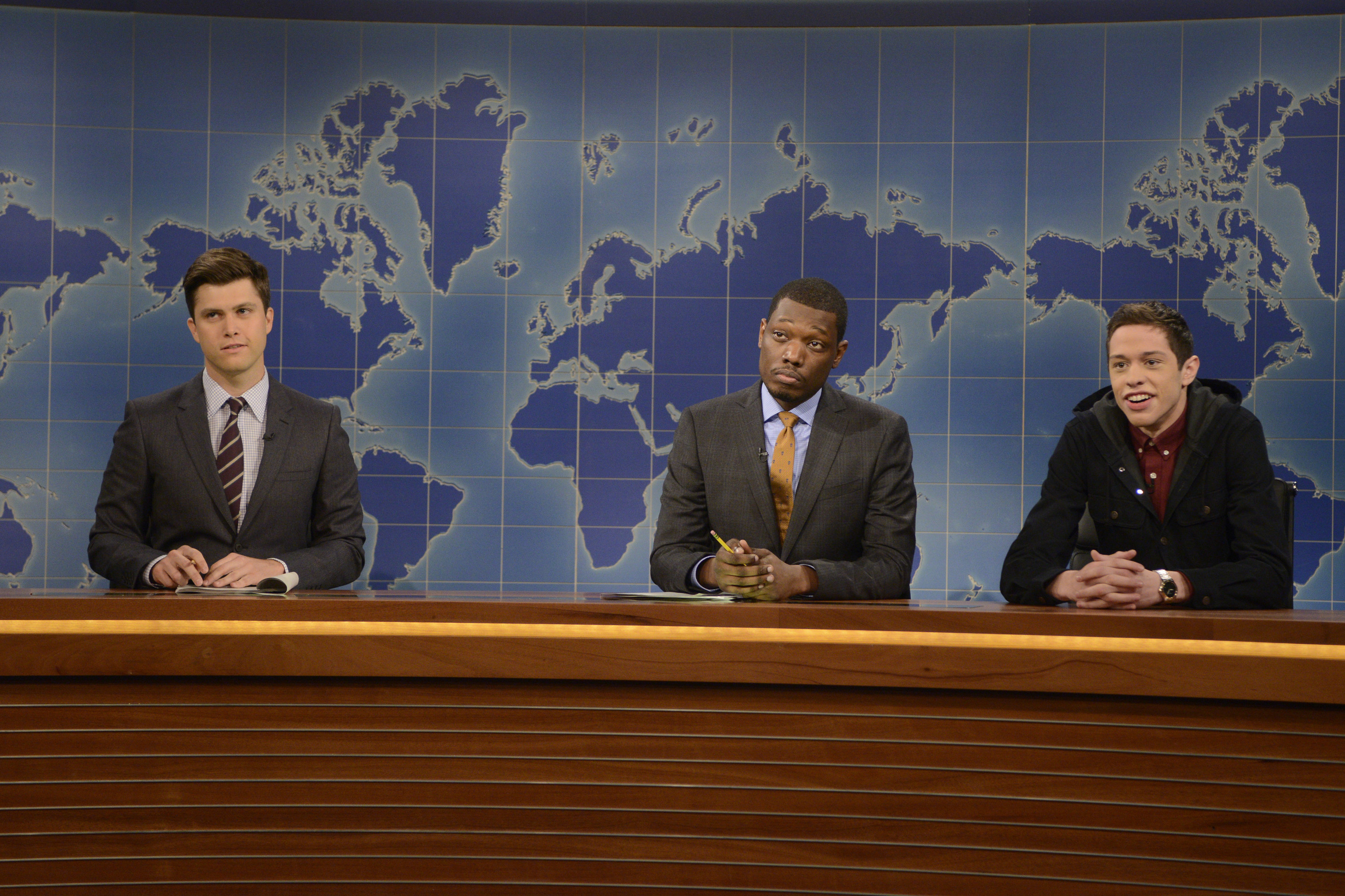 Colin Jost, Michael Che and Pete Davidson as the show&#x27;s resident young person during the &quot;Weekend Update&quot; skit on September 27, 2014