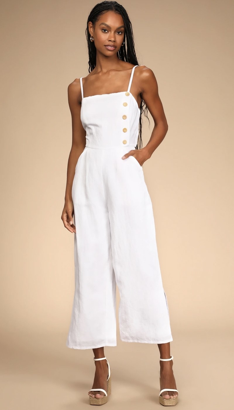 a model wearing the jumpsuit in white