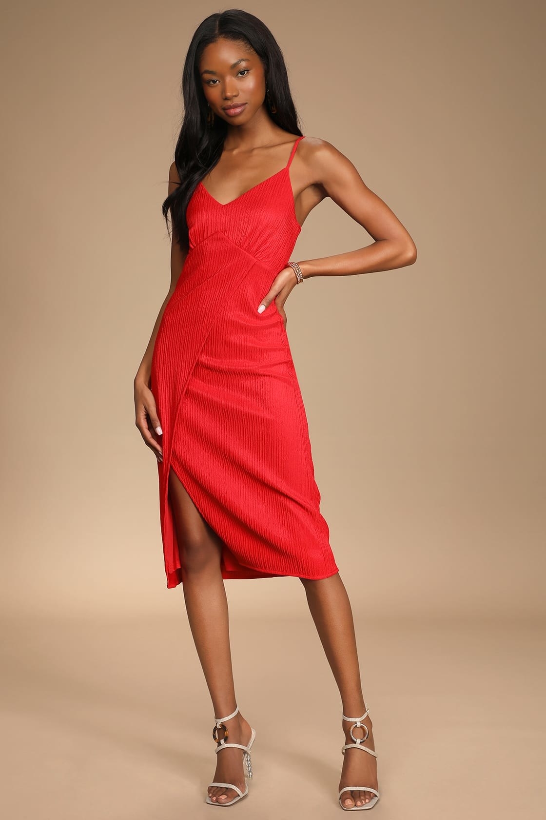 a model wearing the dress in red