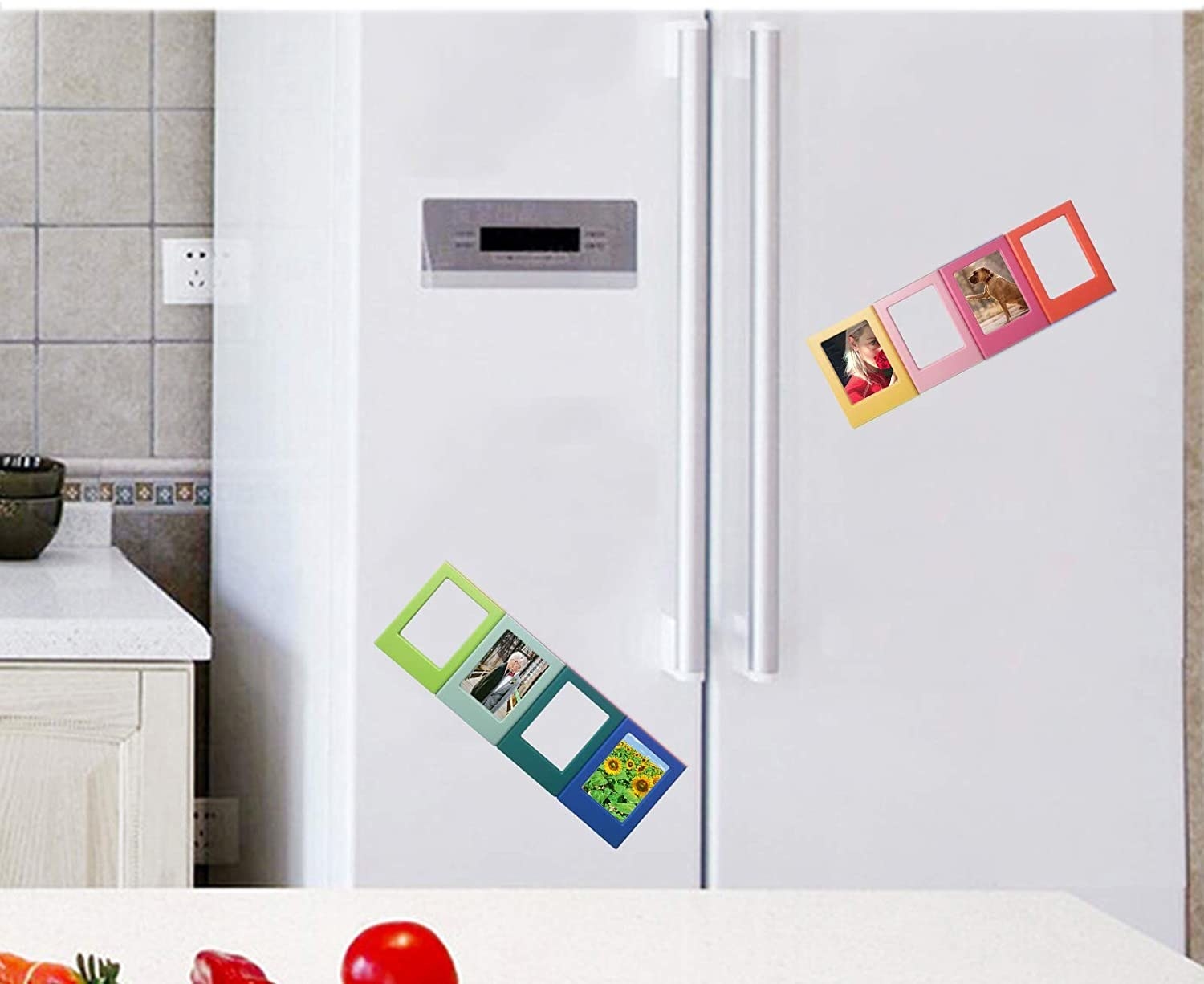the magnets with photos in them on a fridge