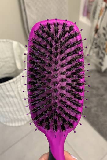 same hairbrush, but clean without hair