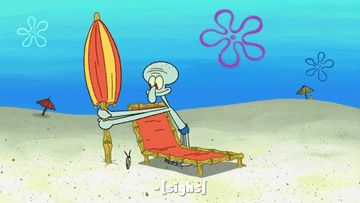 gif of squidward from spongebob sitting on a beach chair