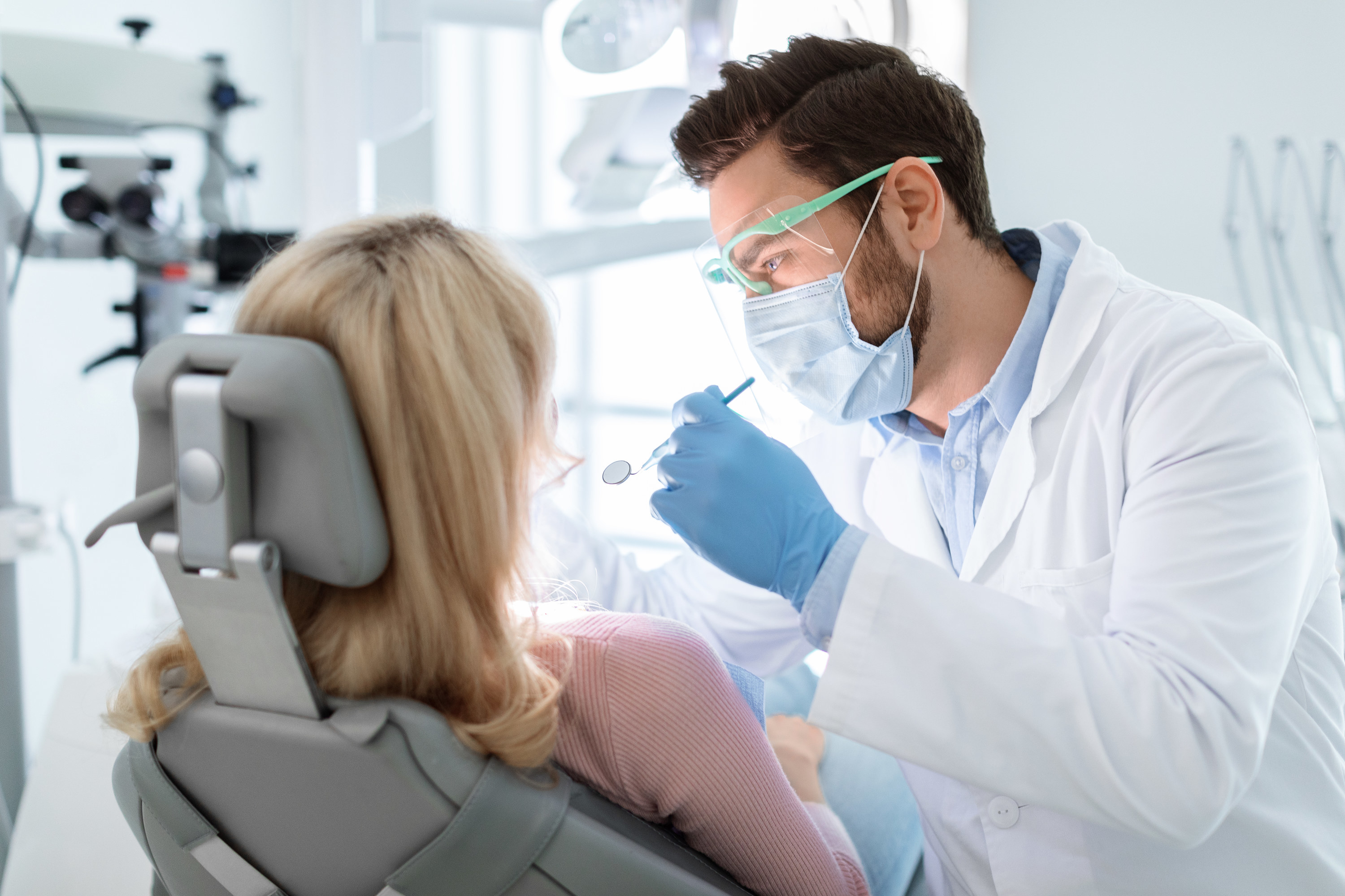 A woman in a dentist&#x27;s chair