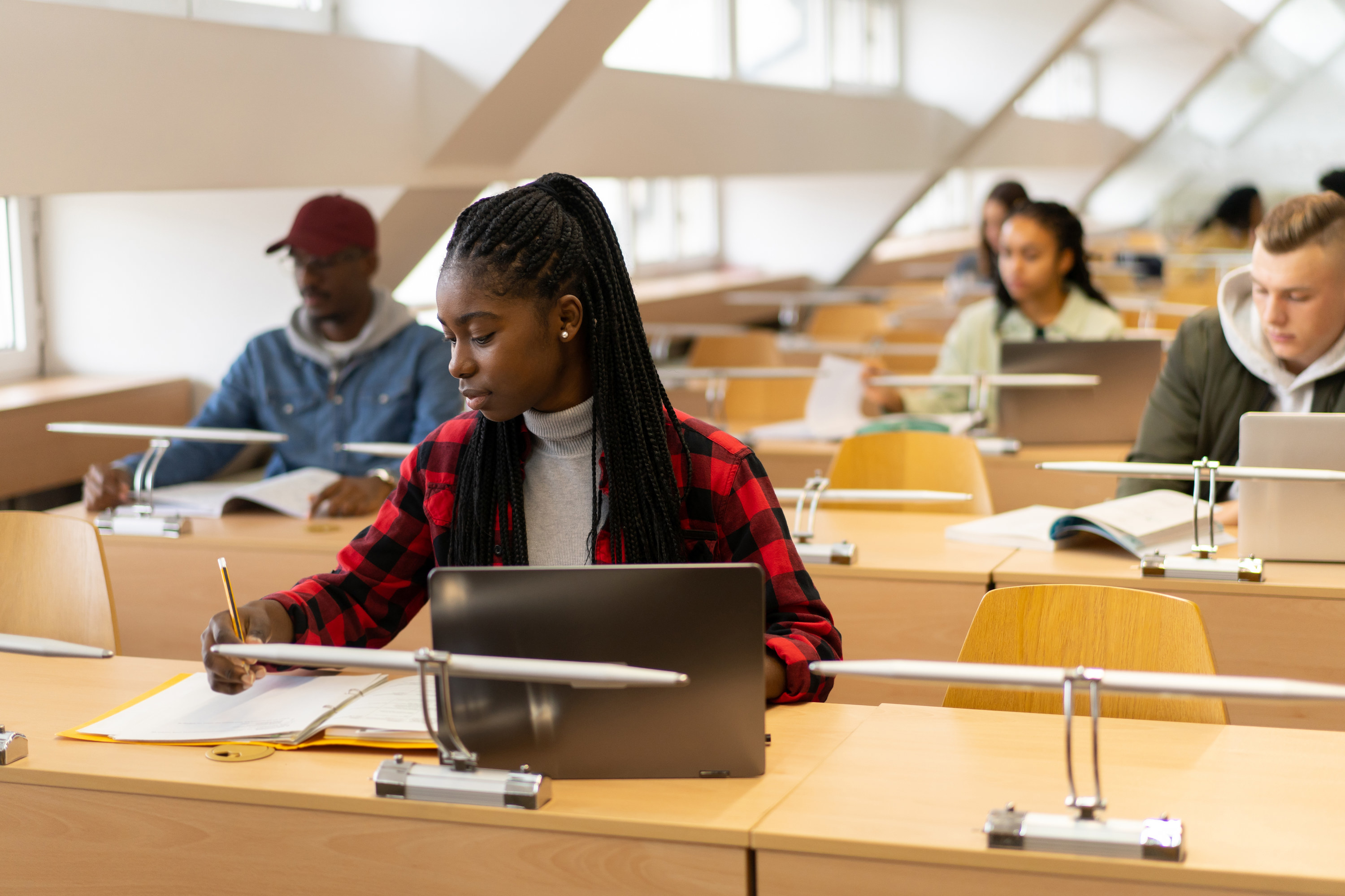 A group of students sitting in class in college