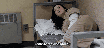 Laura Prepon in &quot;Orange Is the New Black&quot; saying, &quot;Come be my little spoon&quot;