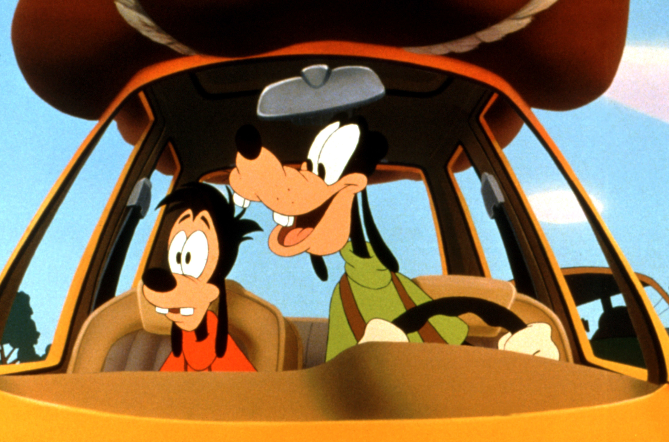 Goofy and Max in a car
