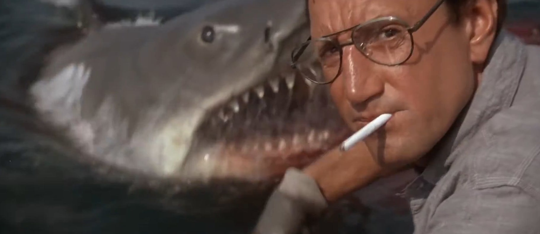 Brody with the shark behind him in "Jaws"