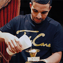 Drake sipping from his Grammy award