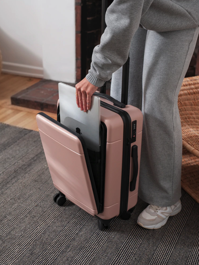 pink carryon luggage