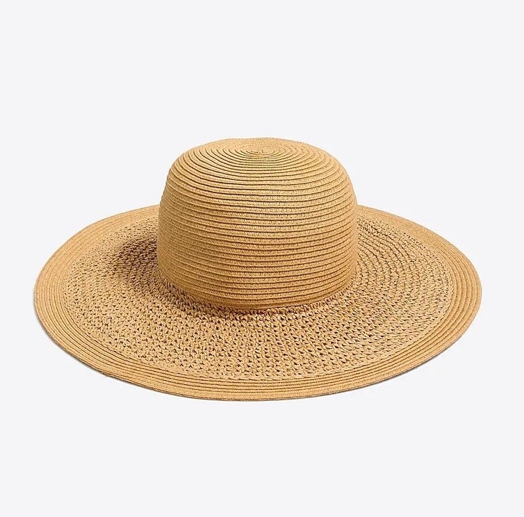 a wide brimmed straw hat