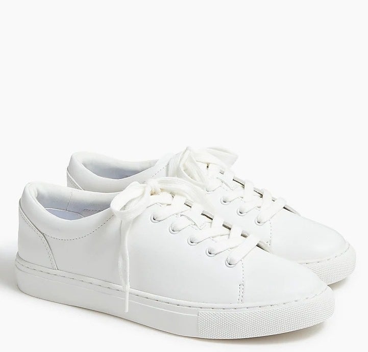 a pair of white tennis shoes