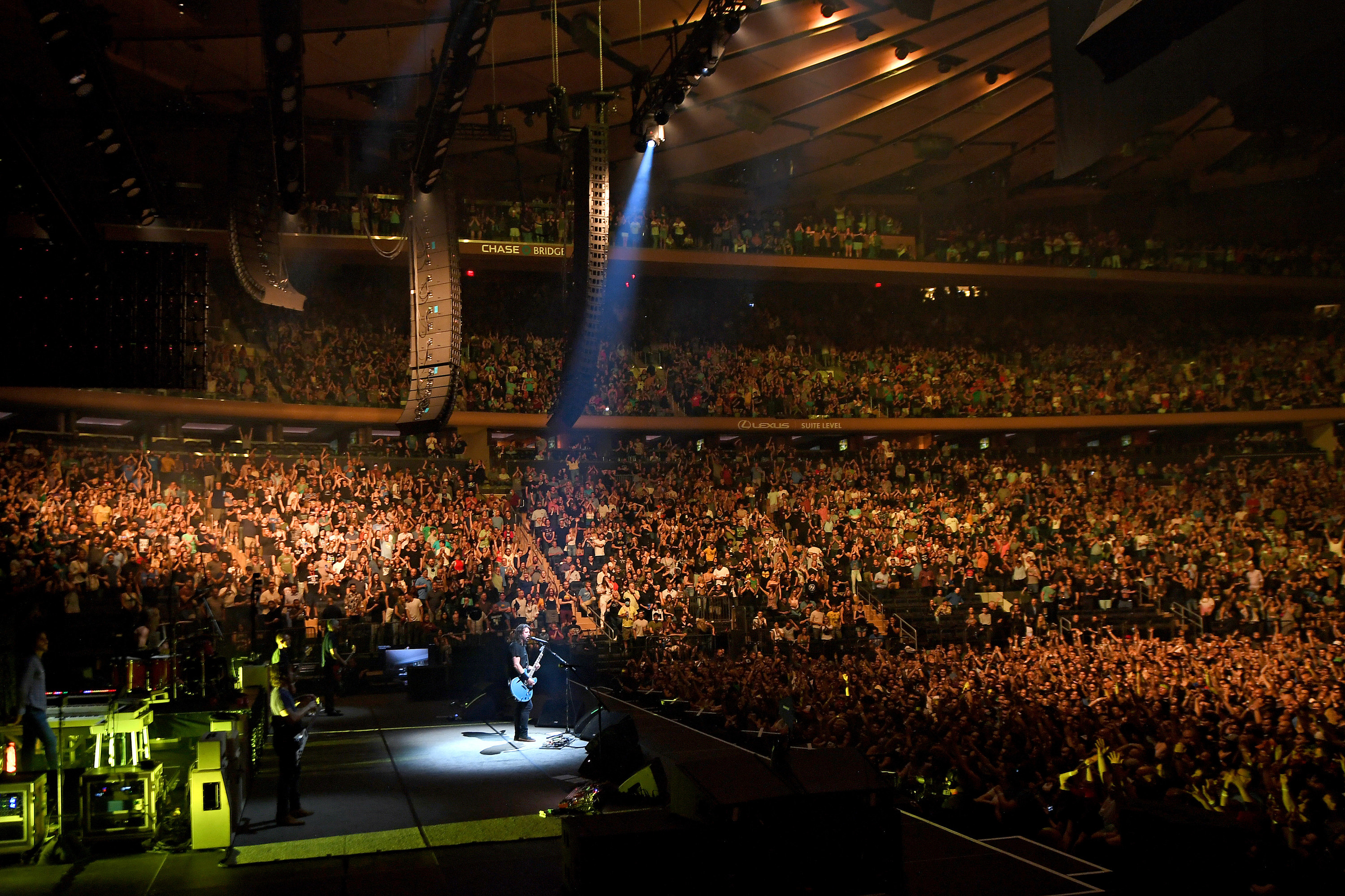 a large concert venue filled with people