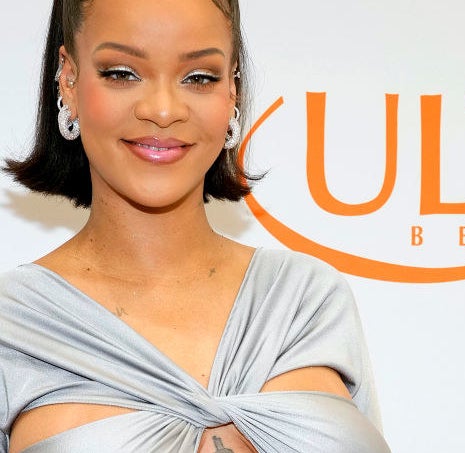 Rihanna wearing her hair slicked back in a pony