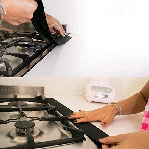 A person applying the strips to their counter