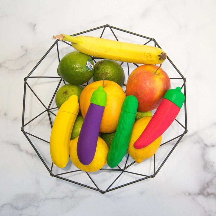 Fruit basket with fruit vibrators and actual fruit