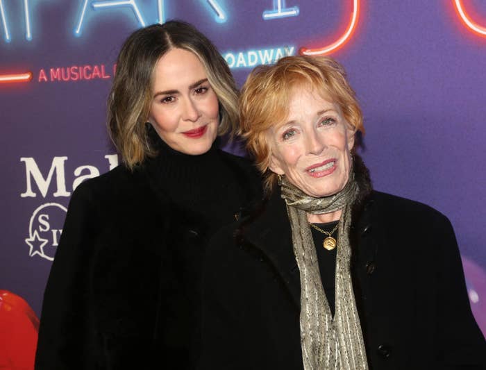 Sarah Paulson and Holland Taylor stand together