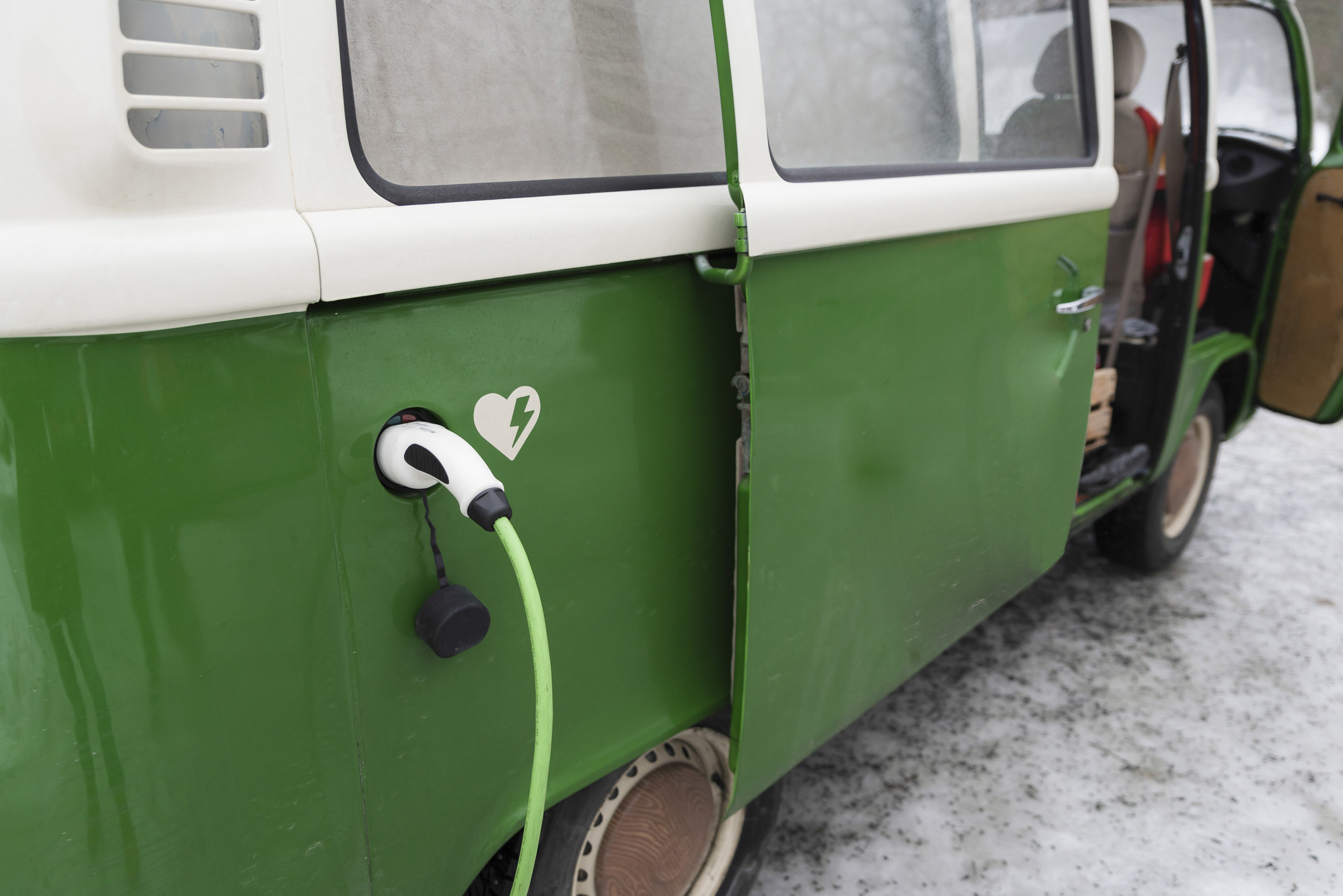 Electric vehicle being charged