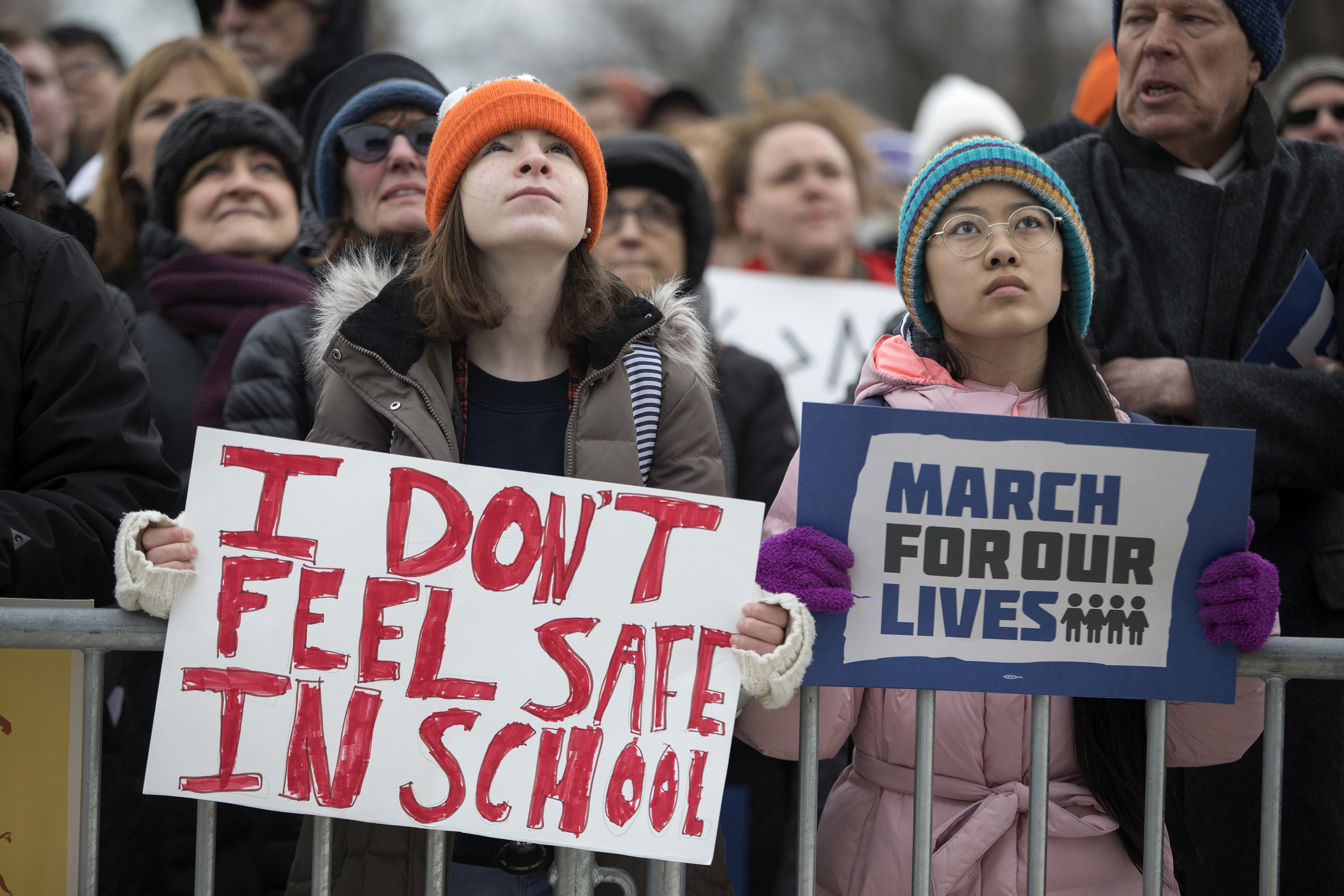 students protesting at the march for our lives with a sign that says I don&#x27;t feel safe in school