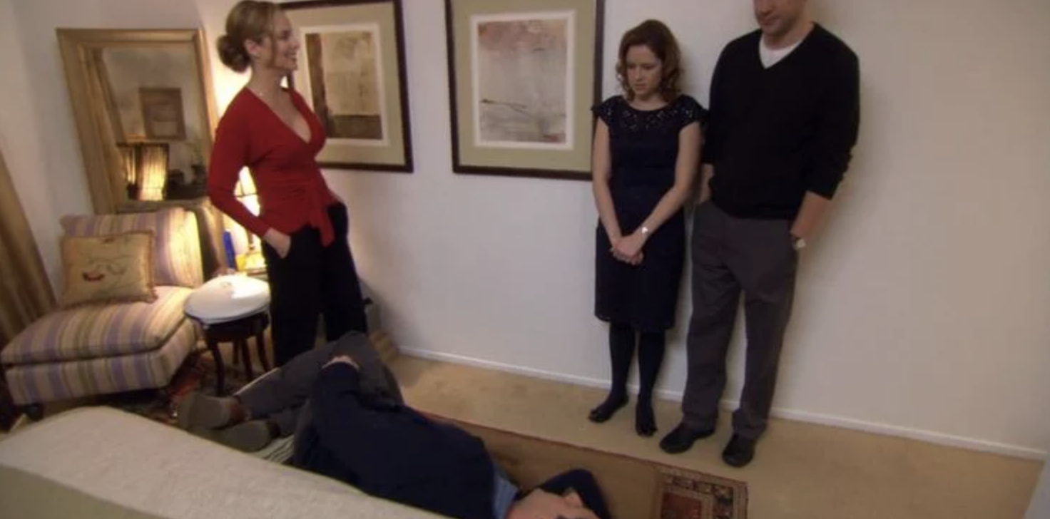 Michael lying in his tiny bed with his shoes on