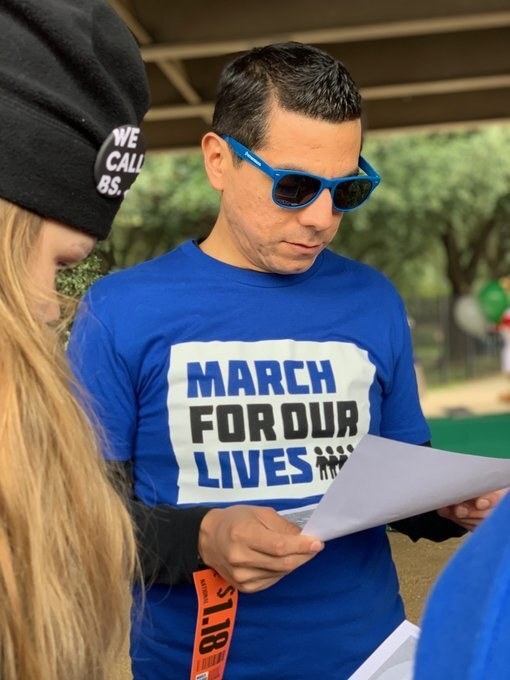 Benjamin Hernandez wears a March for Our Lives T-shirt