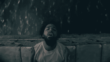 A gif of J. Cole in his music video for 100. mil&#x27;