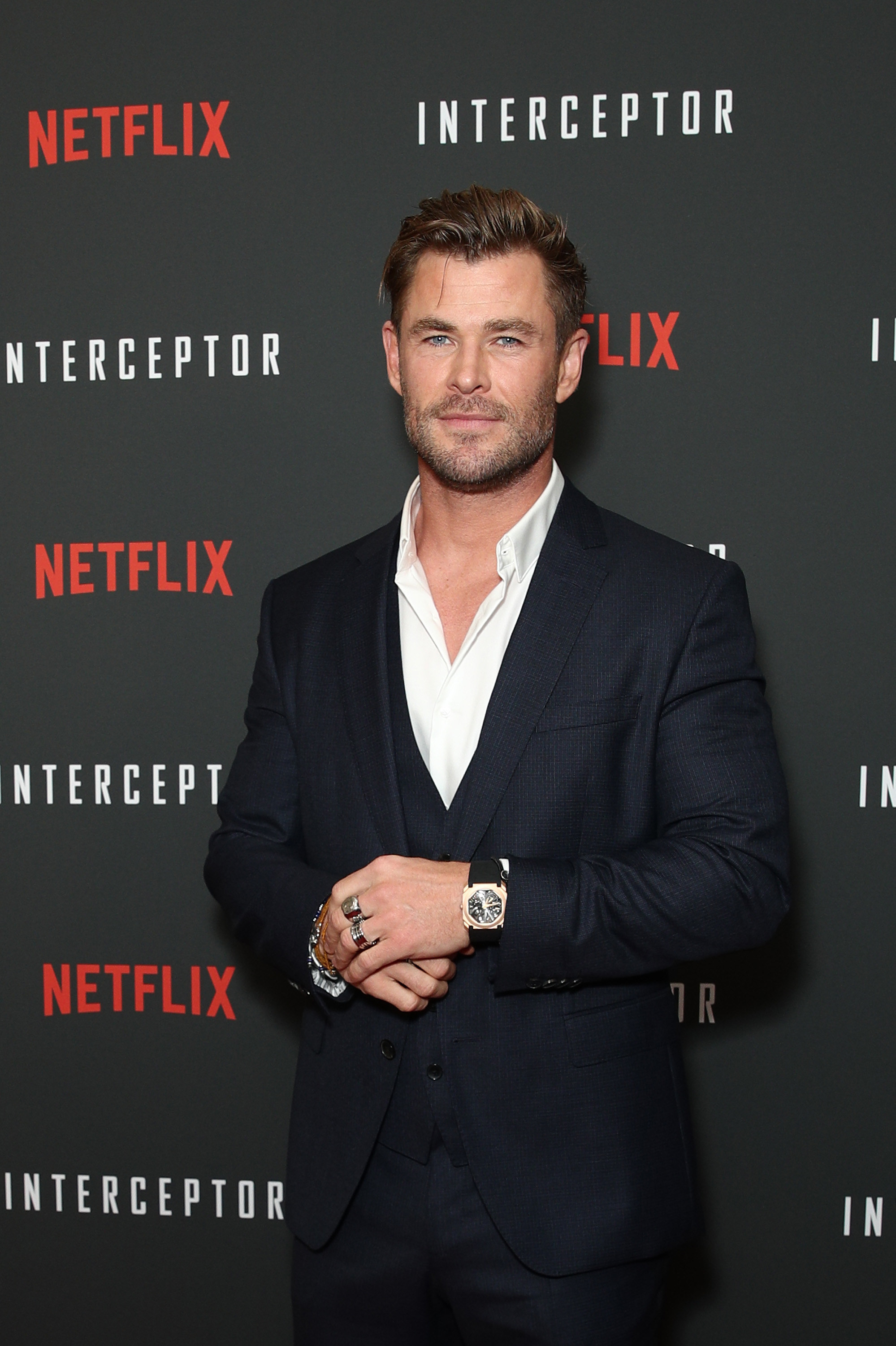 Chris Hemsworth at red carpet screening, in suit