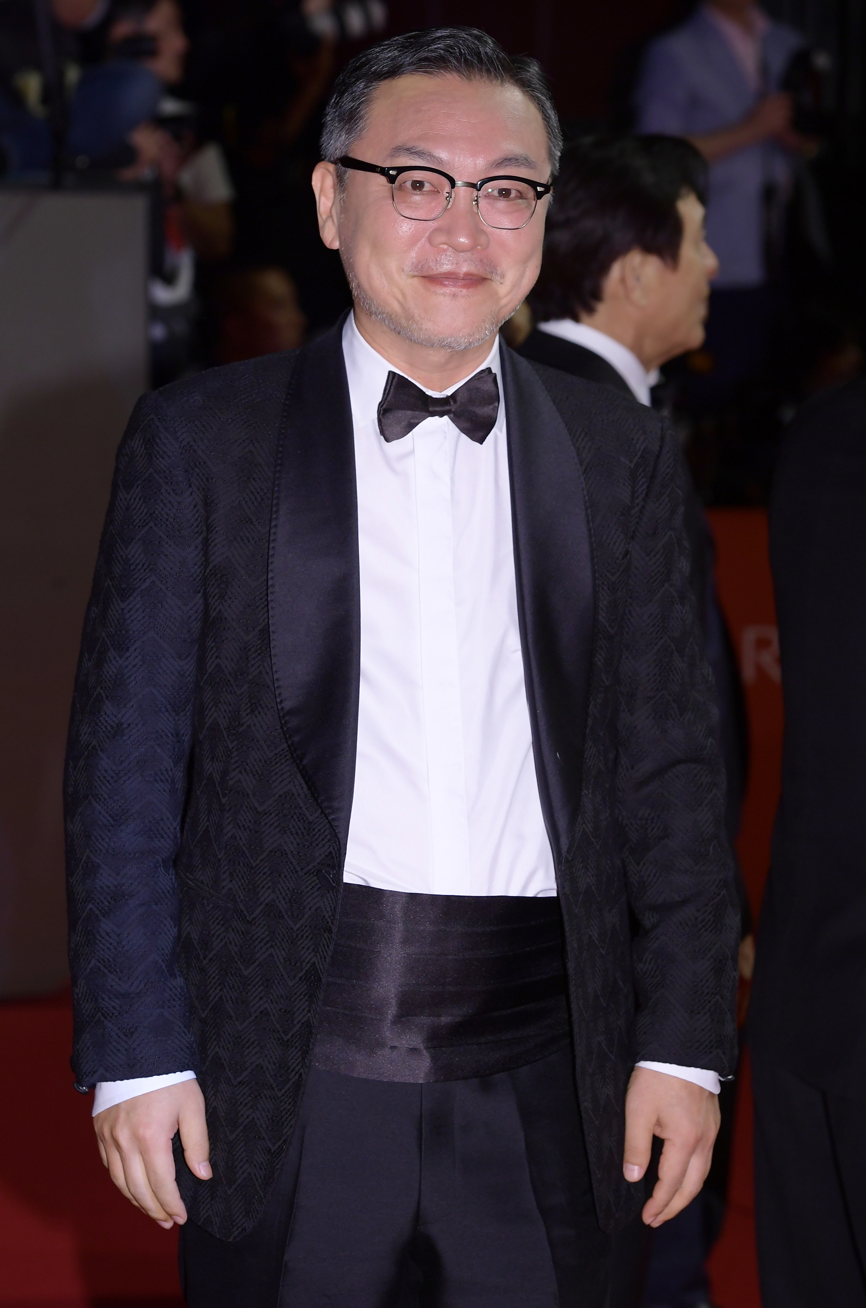 Kim Eui-sung at event in a suit