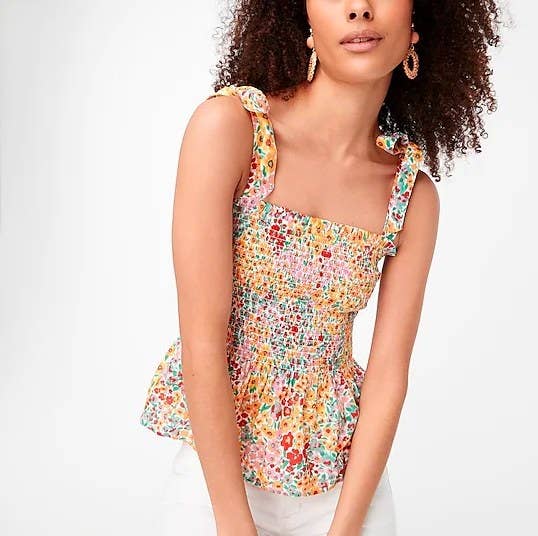 Model wearing floral print top