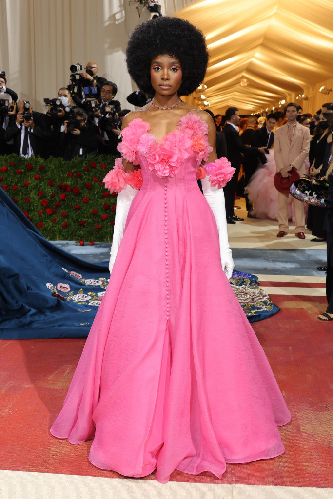 Kiki Layne in a gown with flower embellishments