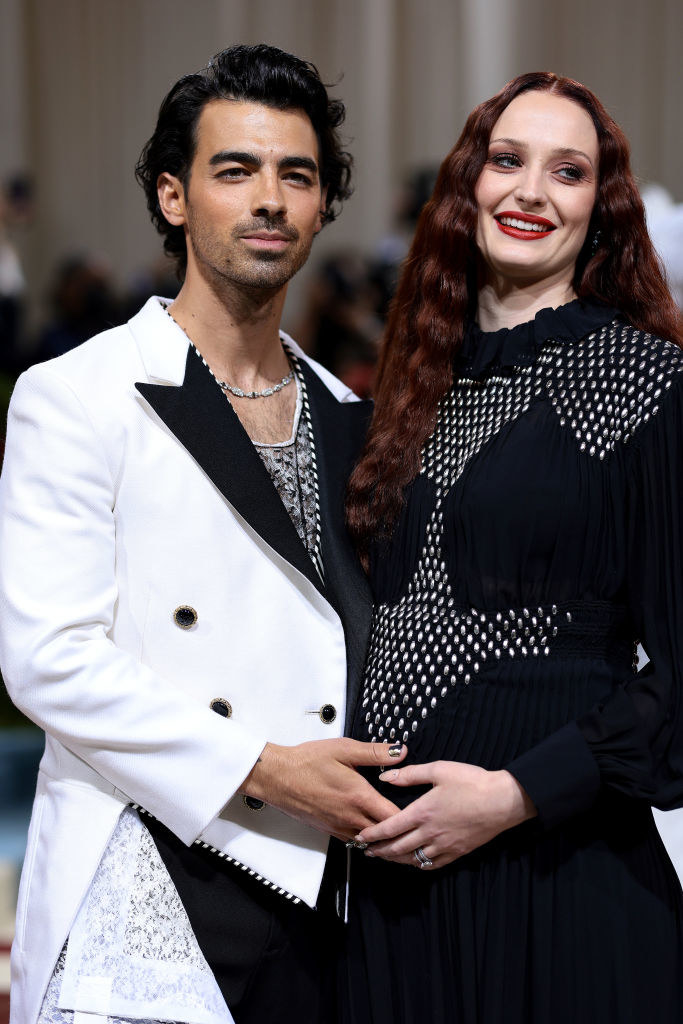 Joe Jonas and Sophie Turner standing together and smiling