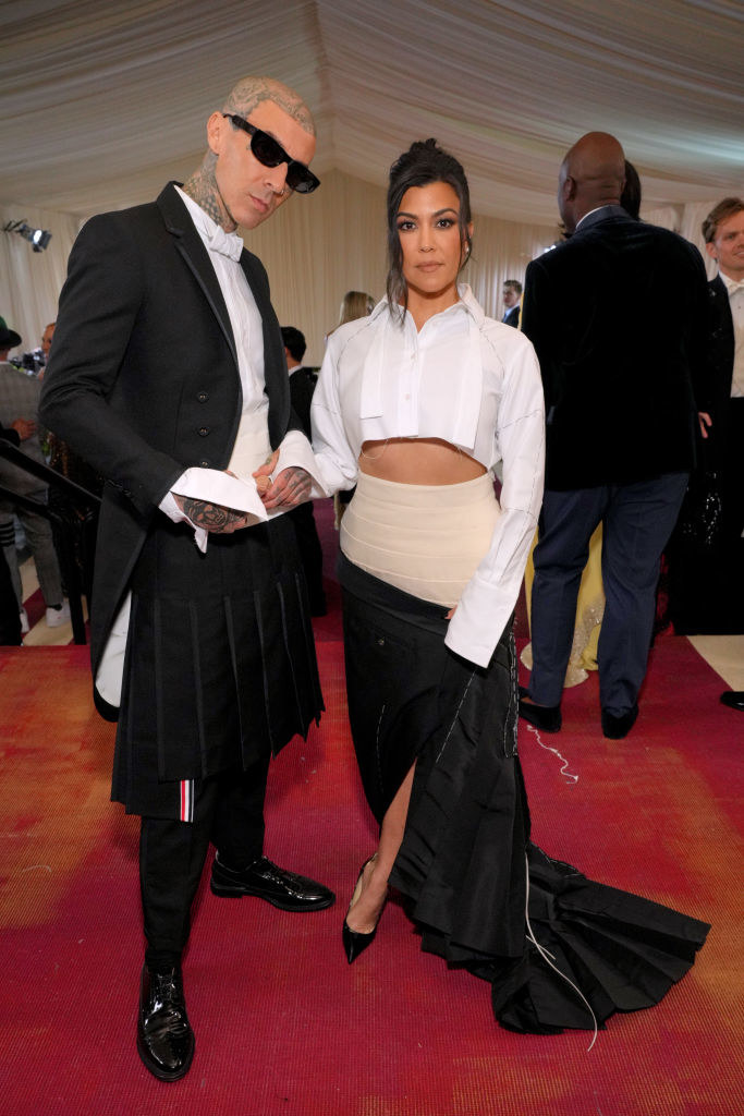 Travis Barker and Kourtney Kardashian in matching outfits