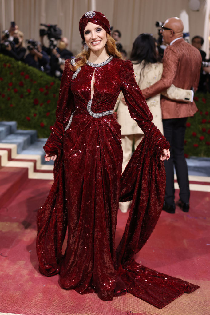 Jessica Chastain in a sequined dress with long sleeves and a long shawl