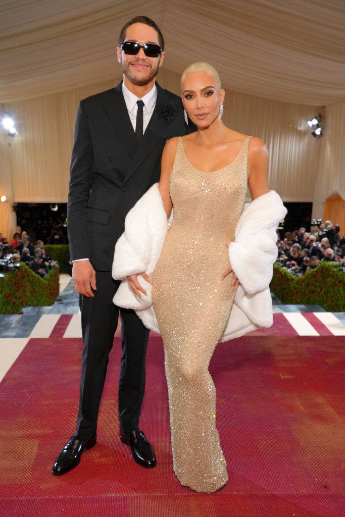 Pete Davidson and Kim K standing together on the red carpet