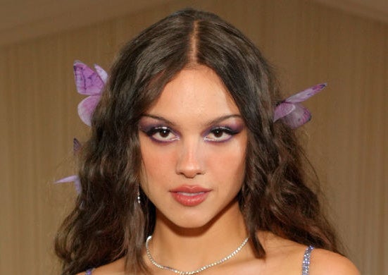 Olivia Rodrigo dramatic eye makeup with butterflies in her hair