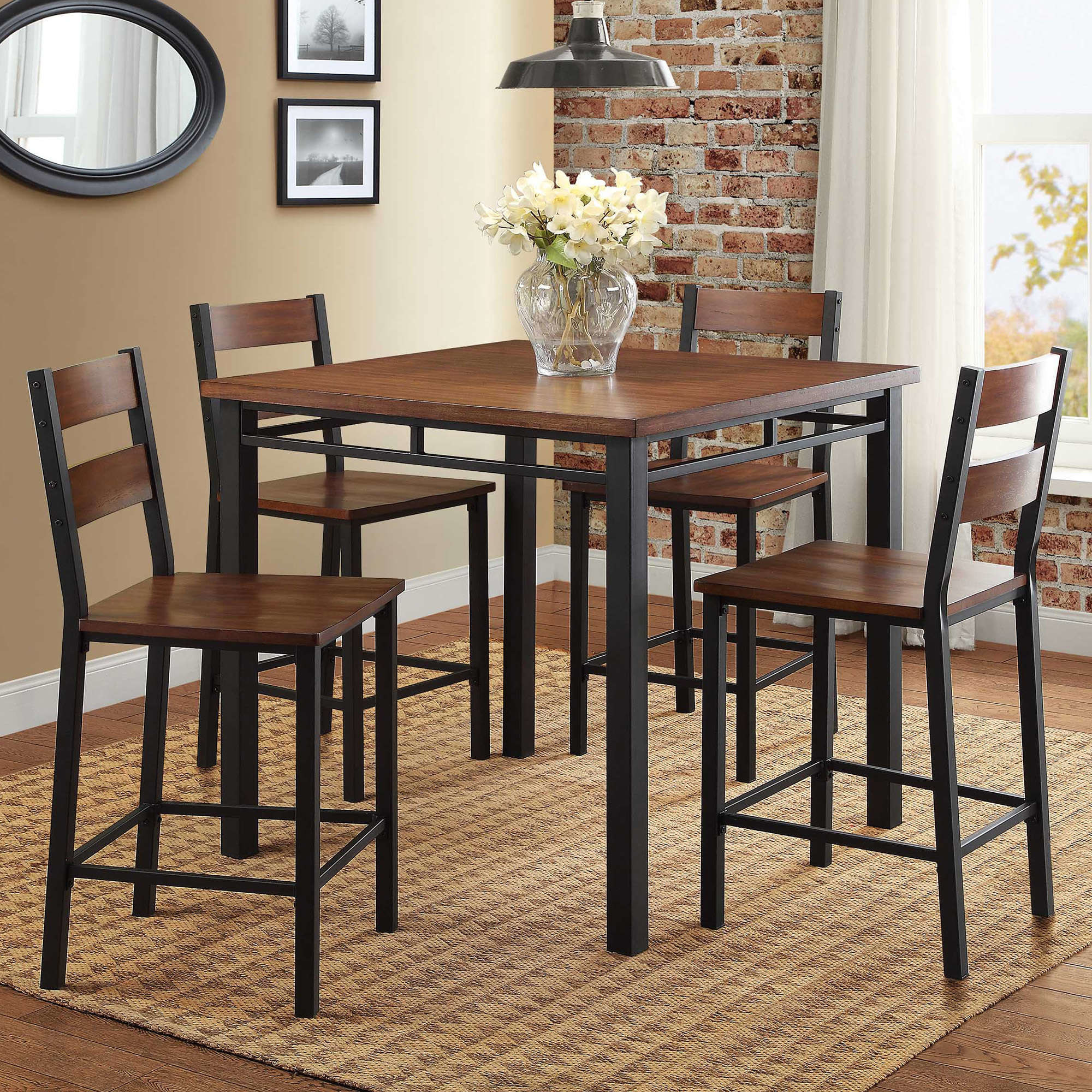An image of a five-piece dining set with four chairs and one table