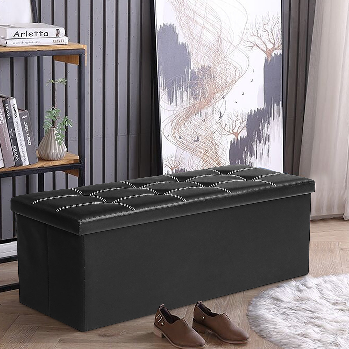 An image of a black foldable storage ottoman that is available in five color choices