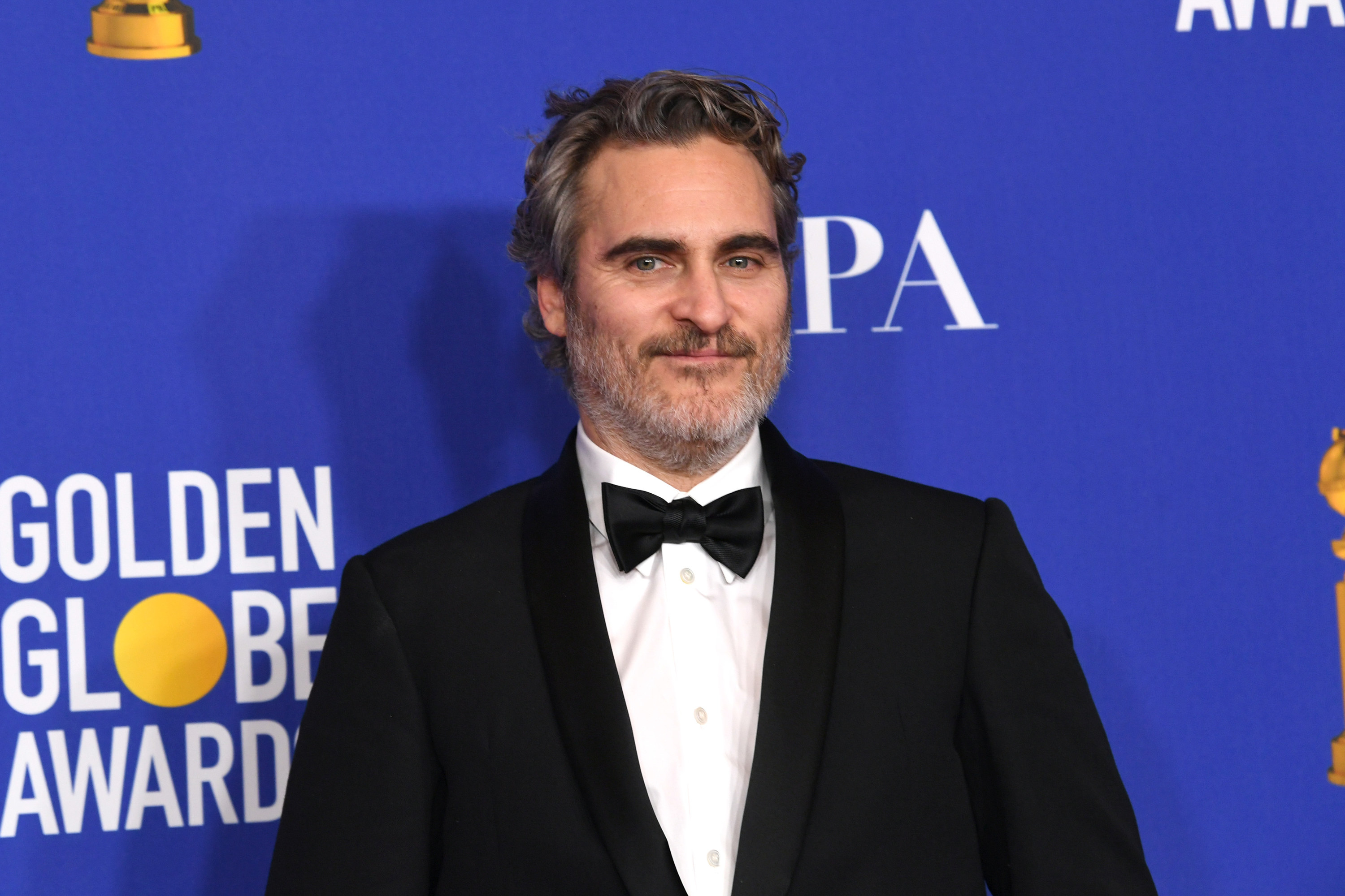 Joaquin Phoenix smiles in the Golden Globes press room on January 05, 2020