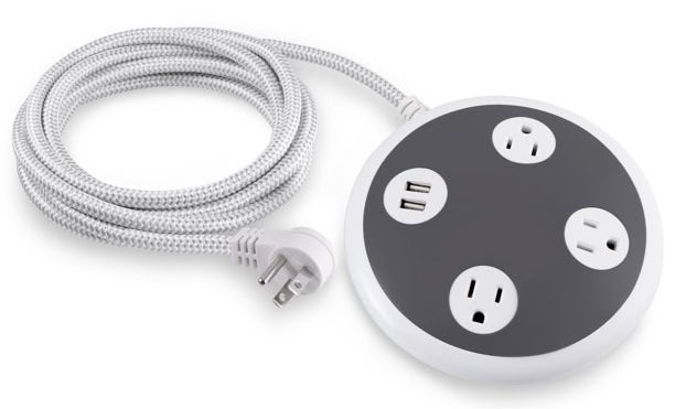 a white braided extension cord/surge protector