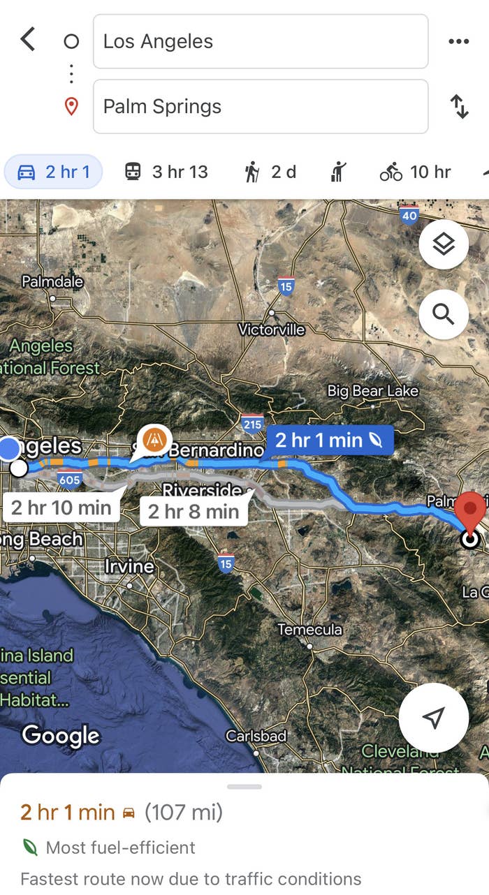 A screencap of the route preview in Google maps for a drive from Los Angeles to Palm Springs; total of 2 hours 1 min or 107 miles