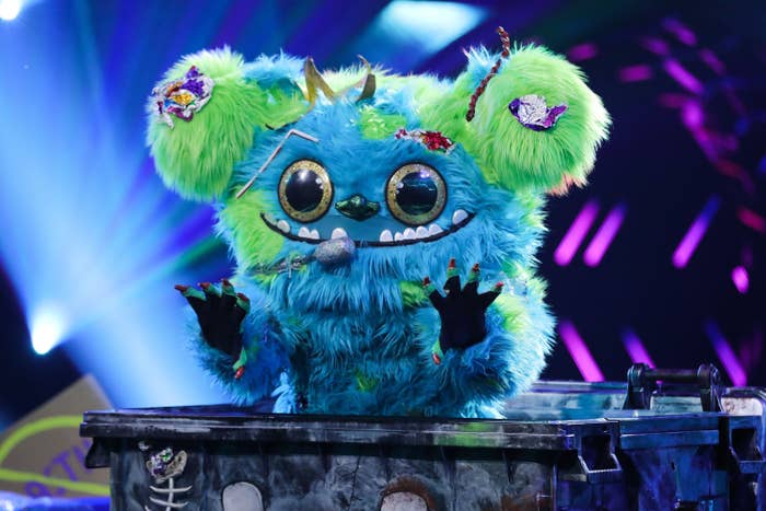 A furry blue and green bear character on &quot;The Masked Singer&quot;