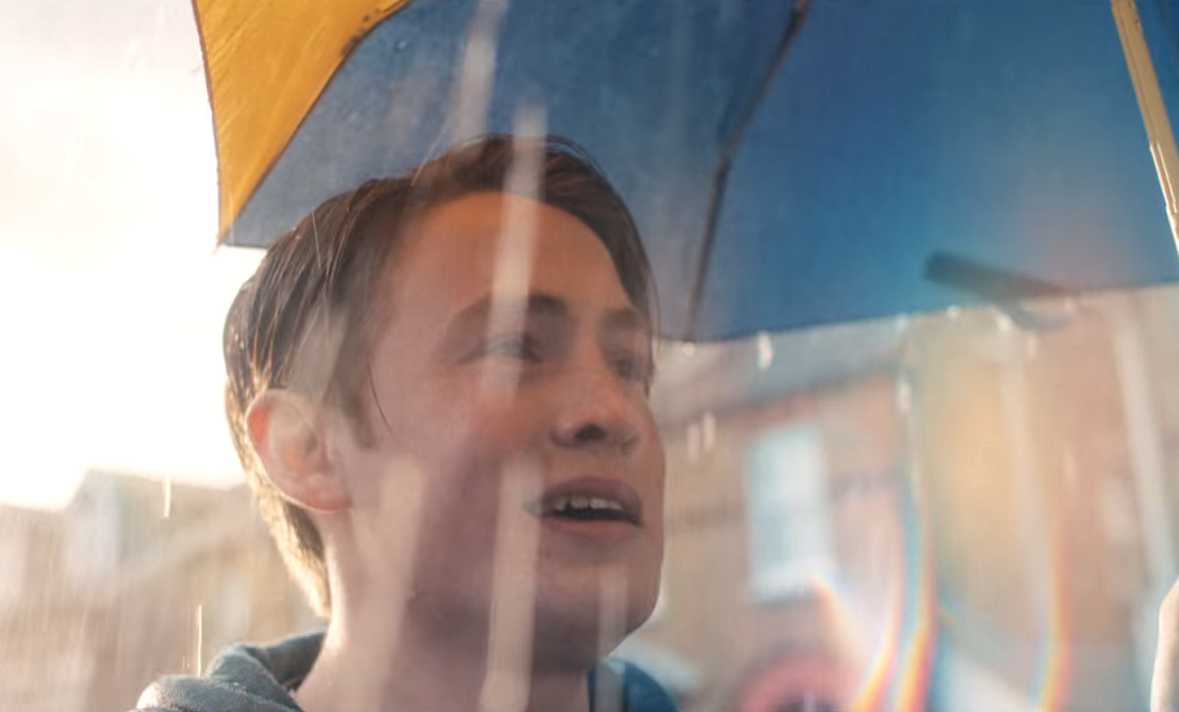 Rainbow lens flare around Nick