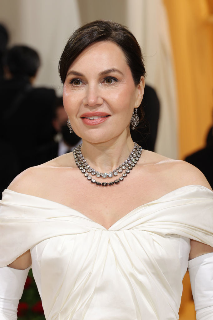 Close-up of Fabiola&#x27;s neckline and bejeweled necklace and earrings