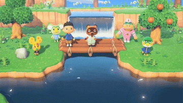 A group of characters in &quot;Animal Crossing: New Horizons&quot; Throwing confetti