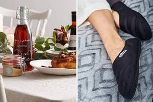 A dining table with a glass bottle of maple syrup on it, A person wearing puffy slippers on their feet
